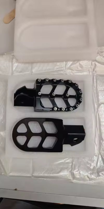 Black foot pegs